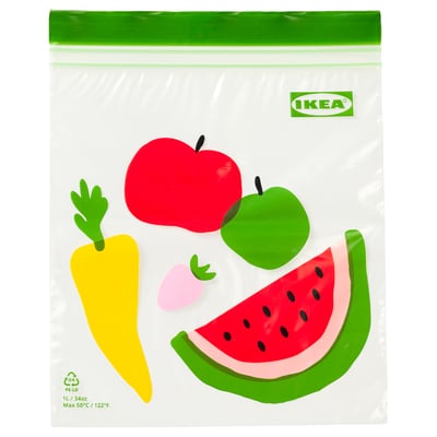 IKEA reusable bag with fruit designs: apples, carrots, strawberries, watermelon.