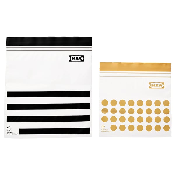 Two ikea ISTAD resealable bags - one black, one gold, transparent, rectangular with top seals.