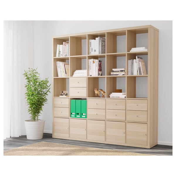 Bookshelf KALLAX: organises books, stores items in drawers and on shelves, serves as a room divider.