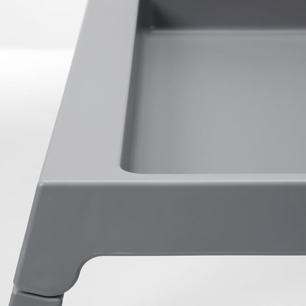 Grey KLIPSK bed tray with smooth edges and clean design, showcasing durable plastic.