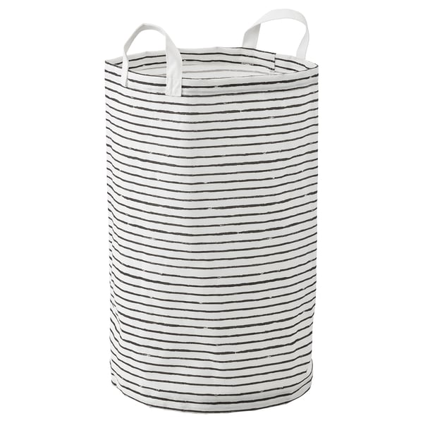 A KLUNKA laundry bag, black and white striped, with sturdy handles for easy transport. Round shape, made of recycled polyester.