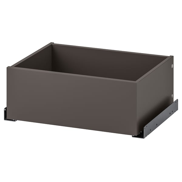 A dark grey KOMPLEMENT drawer, part of a wardrobe system. It a sleek, rectangular design with a semi-matte finish and metal runners.