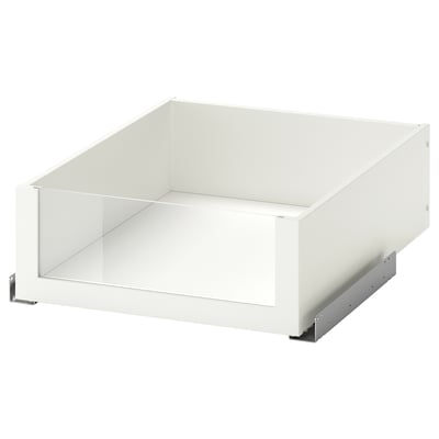 A white KOMPLEMENT drawer with a glass front, featuring a sleek modern design for easy storage access, supported by metallic runners.