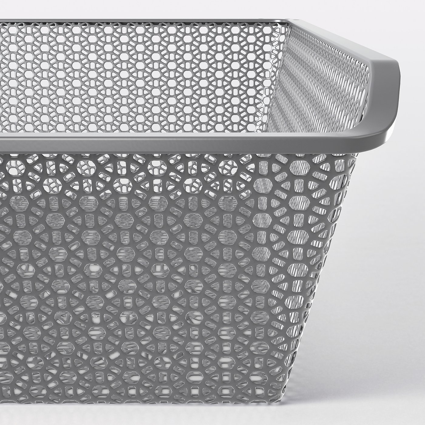 Metal basket with intricate cutouts, ideal for air circulation and organising clothes, displayed on a pulley system.