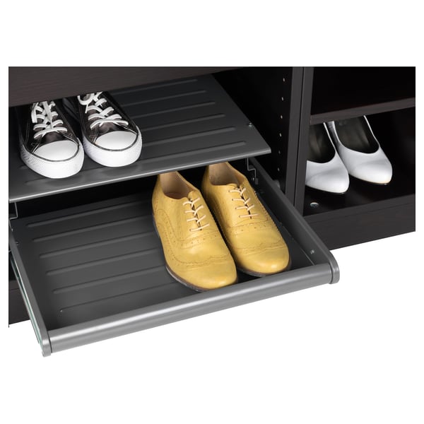 Shoe shelf with pull-out trays holding trendy footwear, demonstrating easy access and efficient storage.