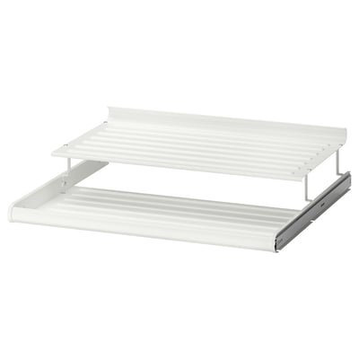 A white KOMPLEMENT metal shoe shelf with alternating levels to maximise storage space.