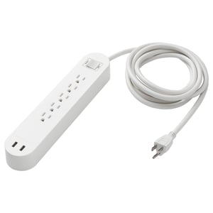 A KOPPLA white surge protector with multiple outlets and two usb ports for charging devices. It has a rectangular shape and a power cord.