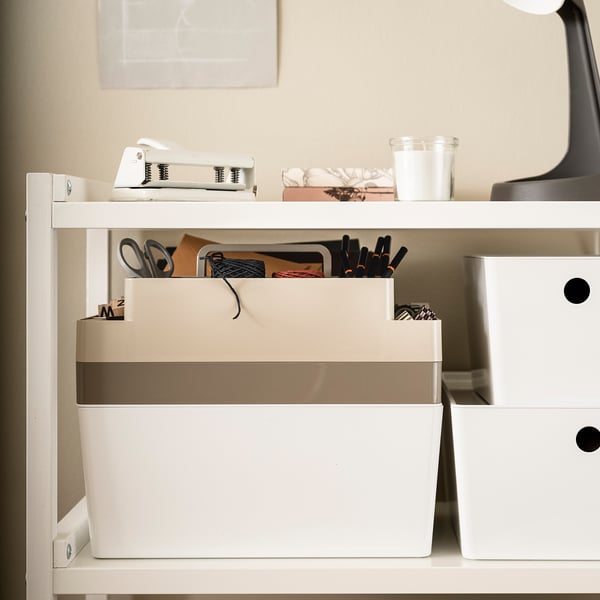 KUGGIS desk organiser: 2-tier white plastic, fits small items, files, laptop. Smaller than books, larger than drawer.