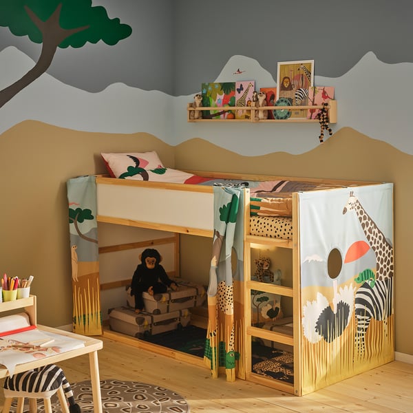KURA bed with safari-themed curtain, blue, polyester, rectangular. Simultaneously large and fitting, positioned centrally with decor around.
