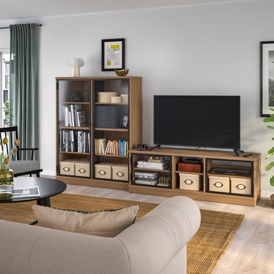 Modern beige living room with LANESUND tv stand and glass-door cabinet, providing ample storage space and a sleek design.