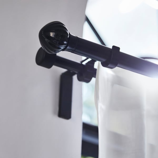 LERBRONIA black ceramic finial on curtain rod, small & sleek.