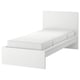 White MALM bed withwhile headboard, slatted base, and white mattress.