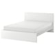 A white, minimalist bedframe called MALM, featuring a high headboard and adjustable bed sides, designed for a clean and modern bedroom.