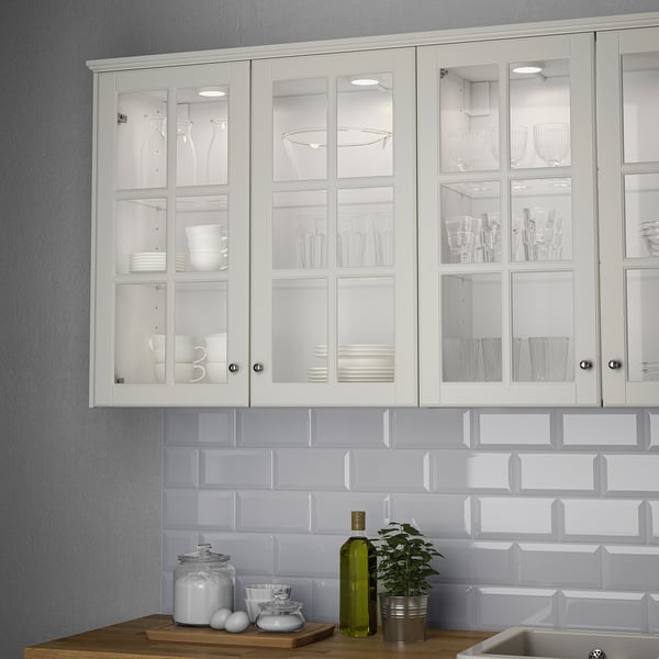 Led kitchen light with clear doors, illuminating items
