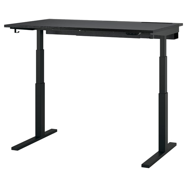Black adjustable height desk with metal legs and control panel, suitable for sit/stand workstations.