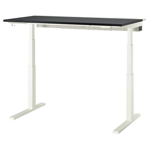 MITTZON sit/stand desk: sleek black top, white legs, easy height adjustment.