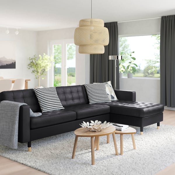 Modern living room with MORABO sectional sofa, pendant light, and plants.