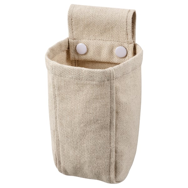 A NEREBY beige fabric organiser with pressed studs for mounting.
