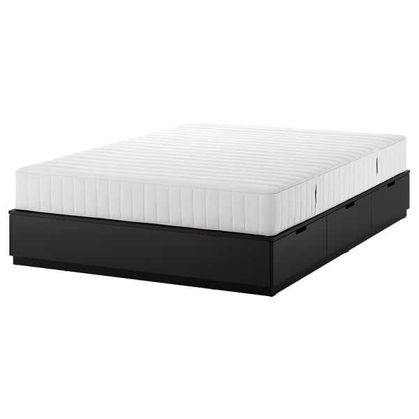 NORDLI black bed frame with six drawers and white mattress.