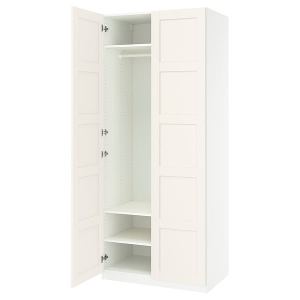 White PAX wardrobe, rectangular shape, with two open doors revealing shelves and a hanging rod.