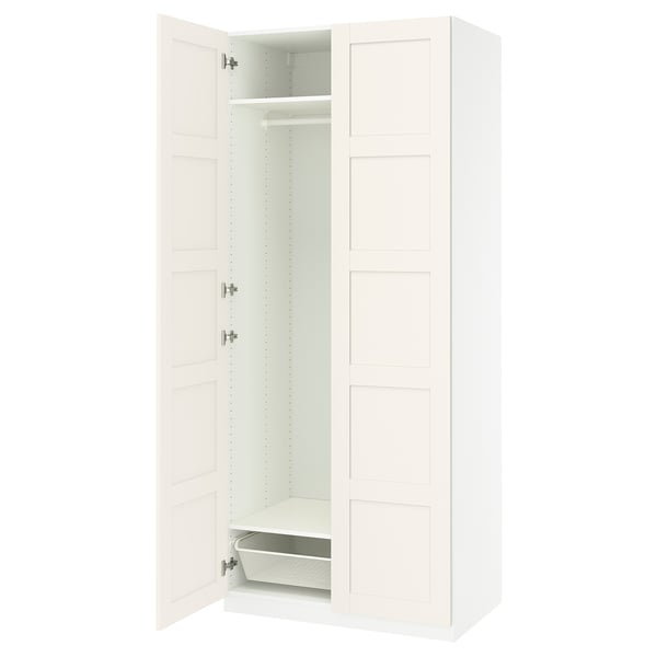 White PAX wardrobe, open door, with shelf and basket.