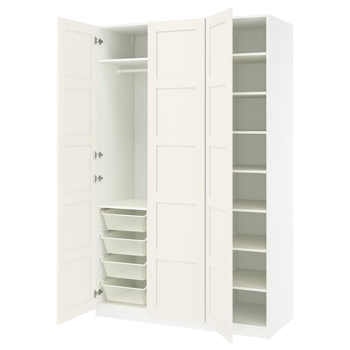White PAX closet system: 3 doors, shelves, mesh baskets, metal/plywood.
