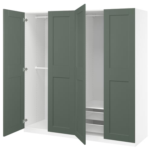 PAX wardrobe in green with open doors, showcasing shelves and storage.