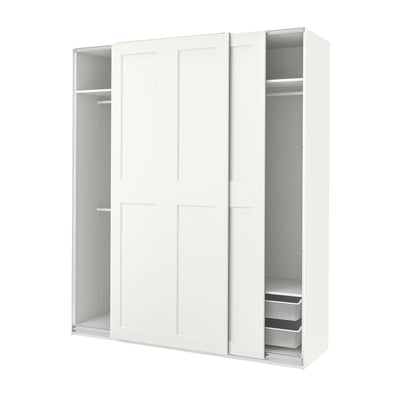 White PAX wardrobe with sliding doors, open sections show shelves and baskets, sleek modern design.