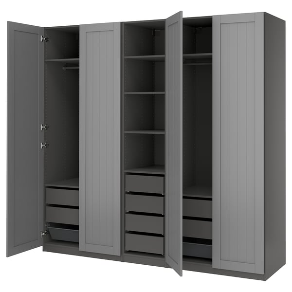 PAX wardrobe: grey, wooden, tall, rectangular, with open doors showing shelves and drawers.