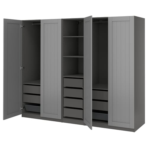 A grey PAX wardrobe with open doors, revealing shelves, drawers, and hanging space.