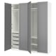 Grey PAX closet with drawers and shelves open.