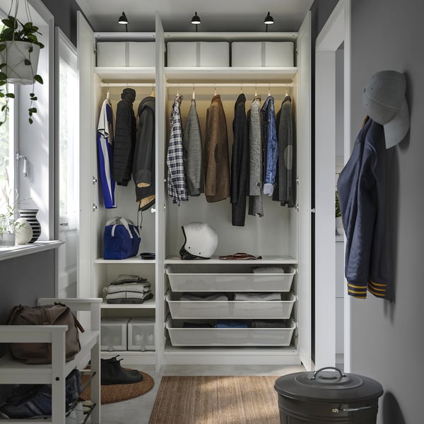 Organised closet with hanging jackets, helmets, folded clothes, and open shelf for bags. 3 shelves, 2 drawers, 2 lights.
