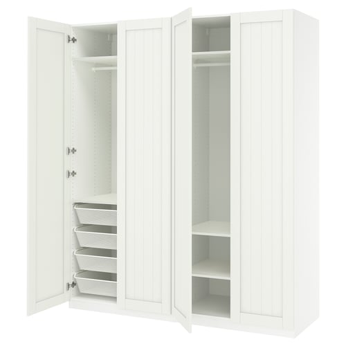Two white PAX wardrobes with doors open, showing adjustable shelves and mesh drawers.