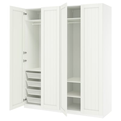 Two white PAX wardrobes with doors open, showing adjustable shelves and mesh drawers.