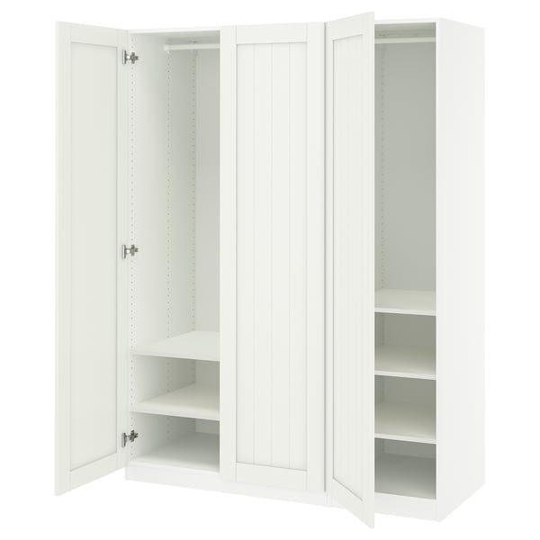 White PAX wardrobe with open doors. Simple, minimalist design, made of particleboard and fibreboard.