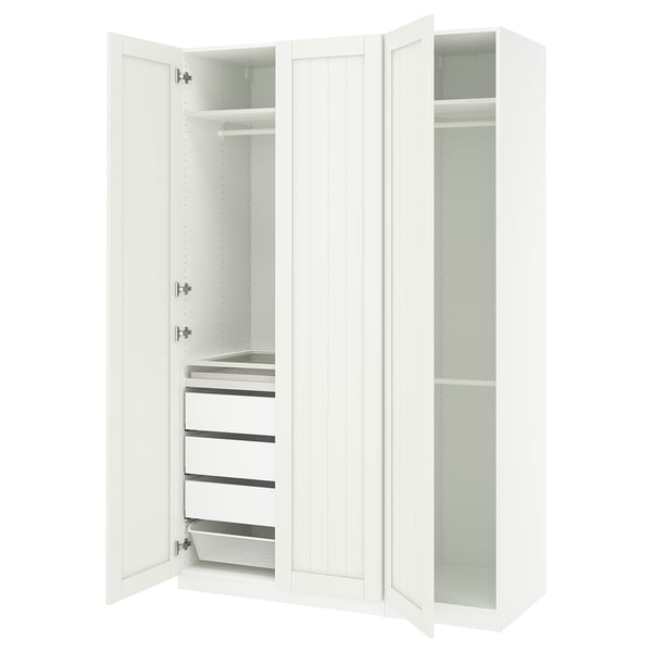 White PAX wardrobe with open doors, spacious shelves, drawers, and hanging space.