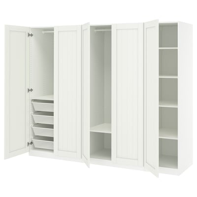 A white PAX wardrobe with shelves and mesh baskets.