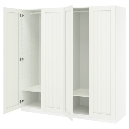 White PAX wardrobe with open doors, featuring shelves and hanging space.