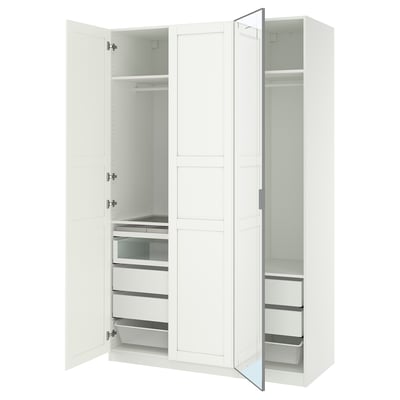 A white PAX wardrobe with mirrored doors, divided into sections with shelves and drawers.