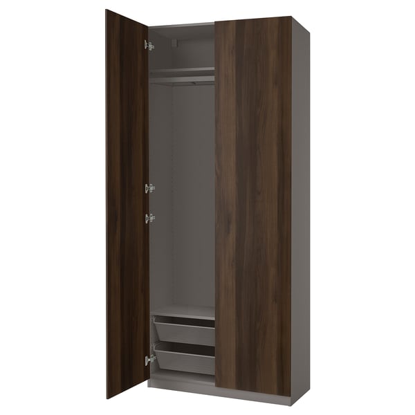 PAX wardrobe, dark wood, narrow frame, soft-closing doors, mesh shelves.