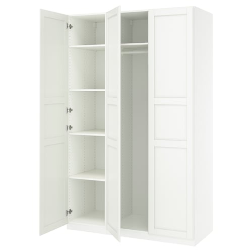 White ikea PAX wardrobe with open doors, showing empty shelves.