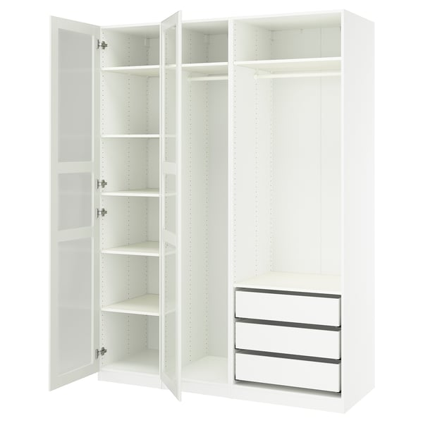 White PAX wardrobe, open doors, clean interior, shelves and rail.