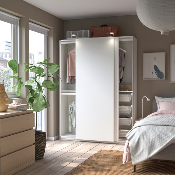 White foldable PAX wardrobe, acrylic paint finish, grey interior, modern bedroom setting with natural light.