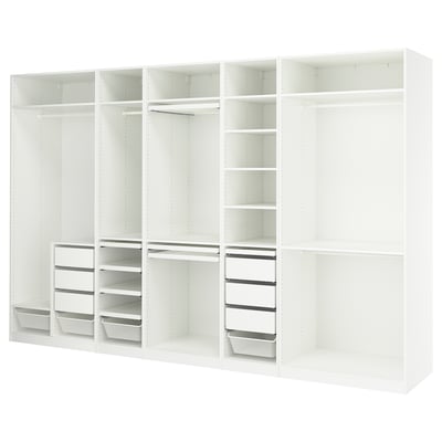White IKEA PAX wardrobe with shelves, drawers, and hanging space.