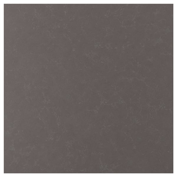 A dark grey, smooth quartz wall panel.