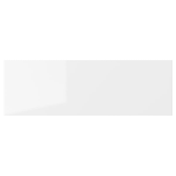 White glossy kitchen drawer front, sleek and modern design.