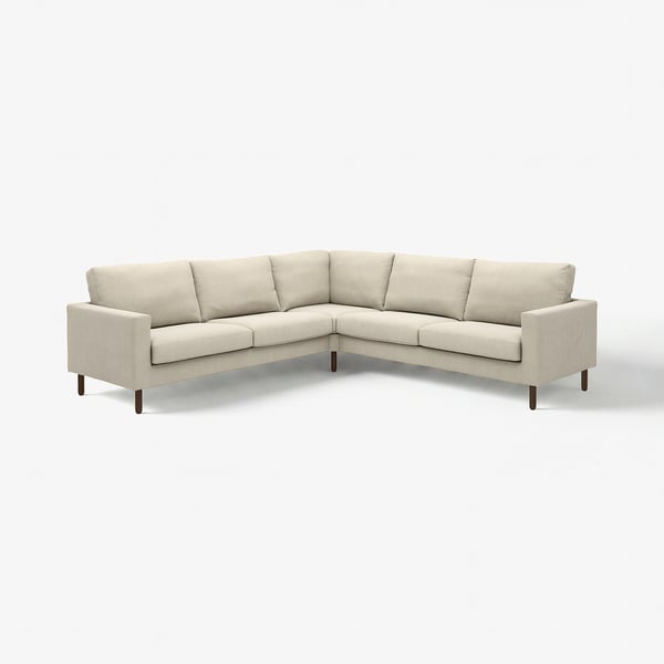 SALTSJÖBADEN sectional sofa; beige; light grey fabric over wood; l-shape; minimalist design.