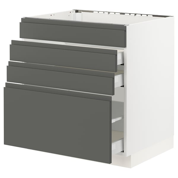 An ikea SEKTION kitchen unit with dark grey voxtorp drawers, featuring a sleek, modern design with integrated handles.