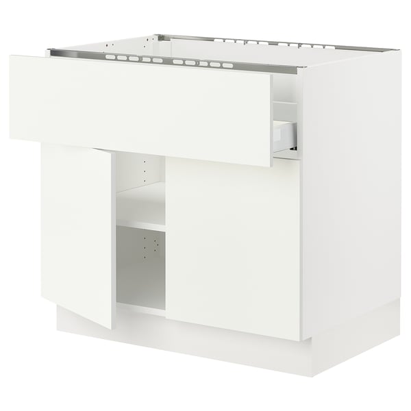 SEKTION white kitchen cabinet with adjustable shelf and snap-on hinges.