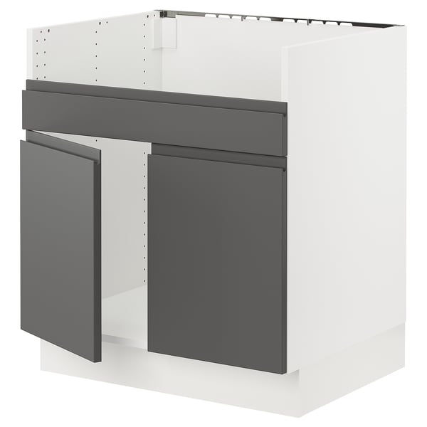 SEKTION kitchen unit in dark grey with white top, l-shape design.